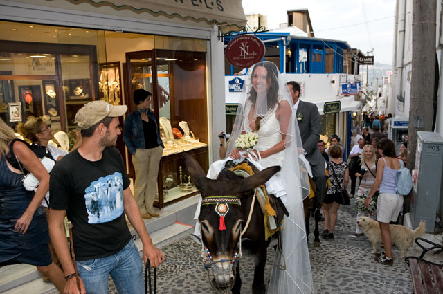 happy-couple-riding-donkeys